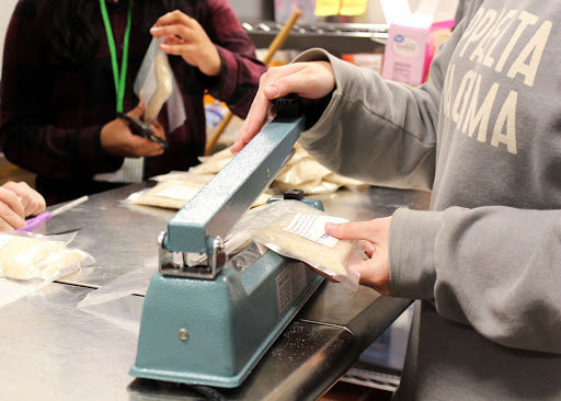 Pantry Volunteers Prepare Supplies for Faculty, Staff to Take Home